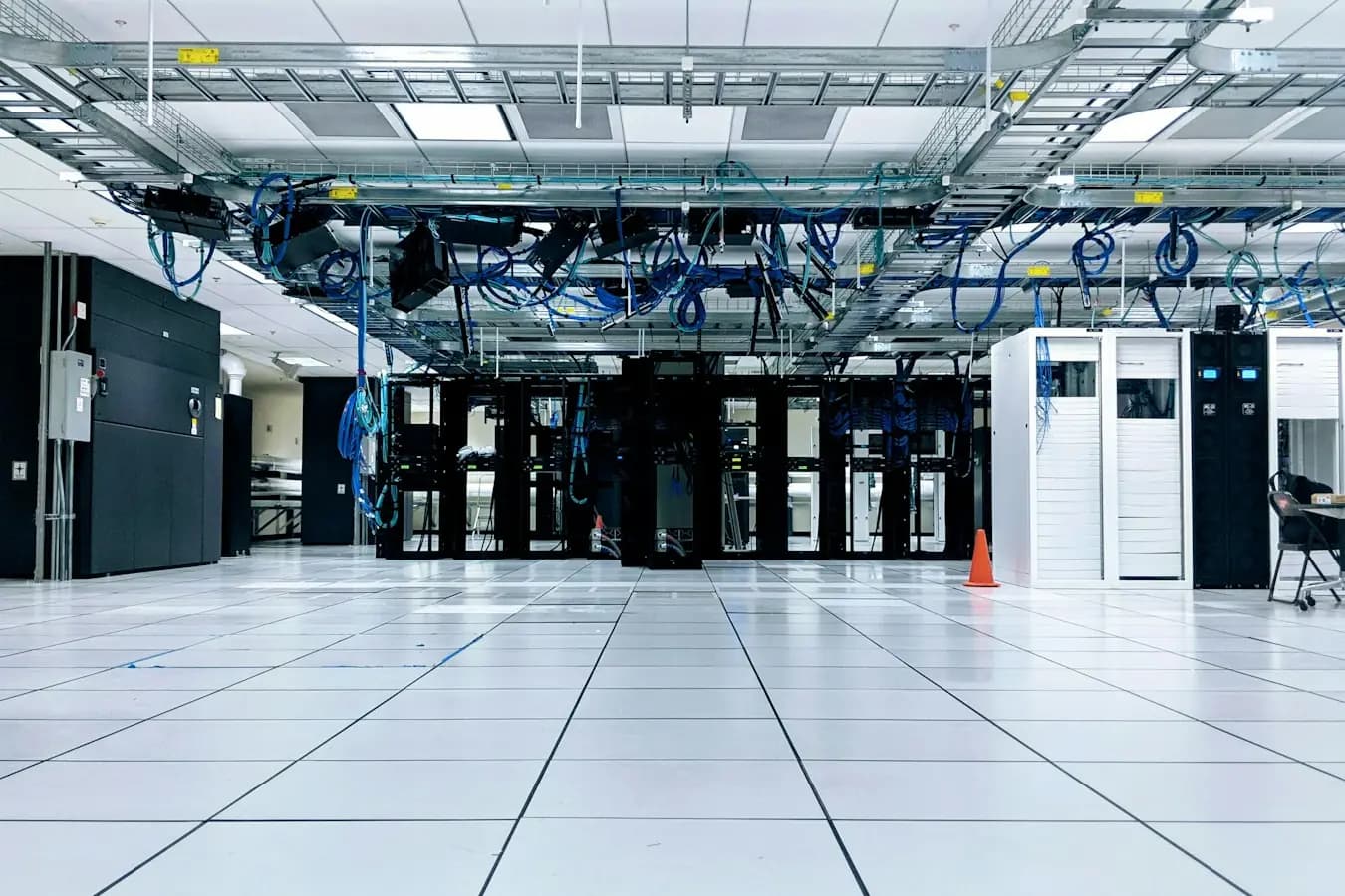 Rows of locked server cabinets in a secure data room